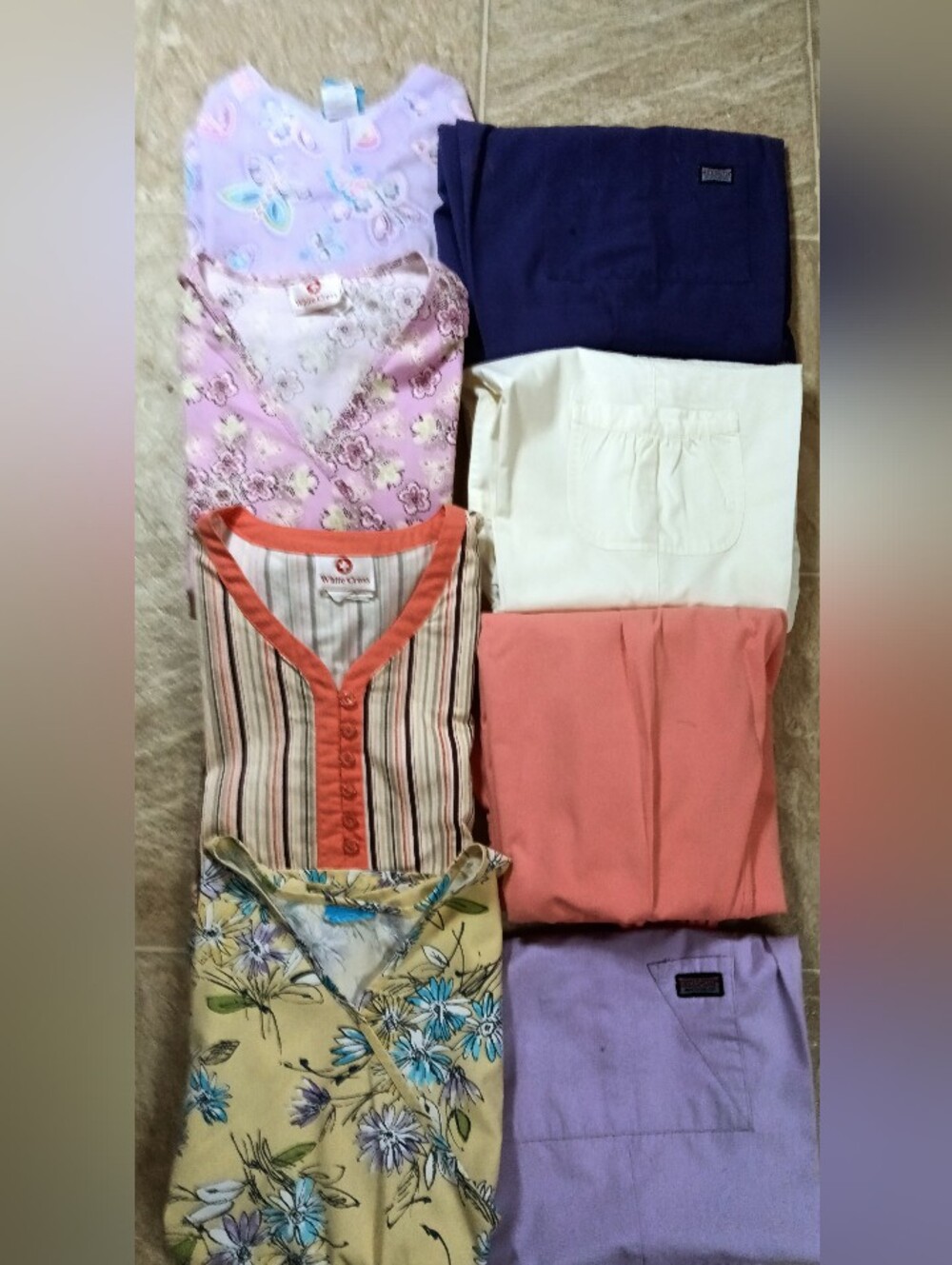 4 matching pair of like new size small scrubs